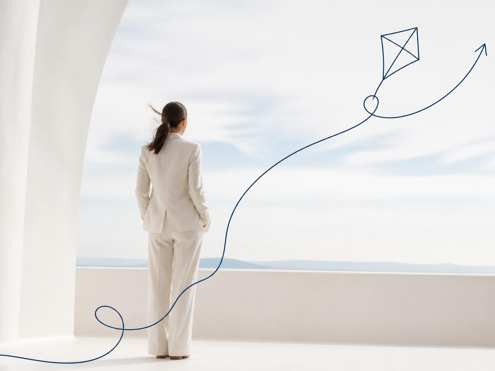 Two marketing professionals mapping a plan on a whiteboard